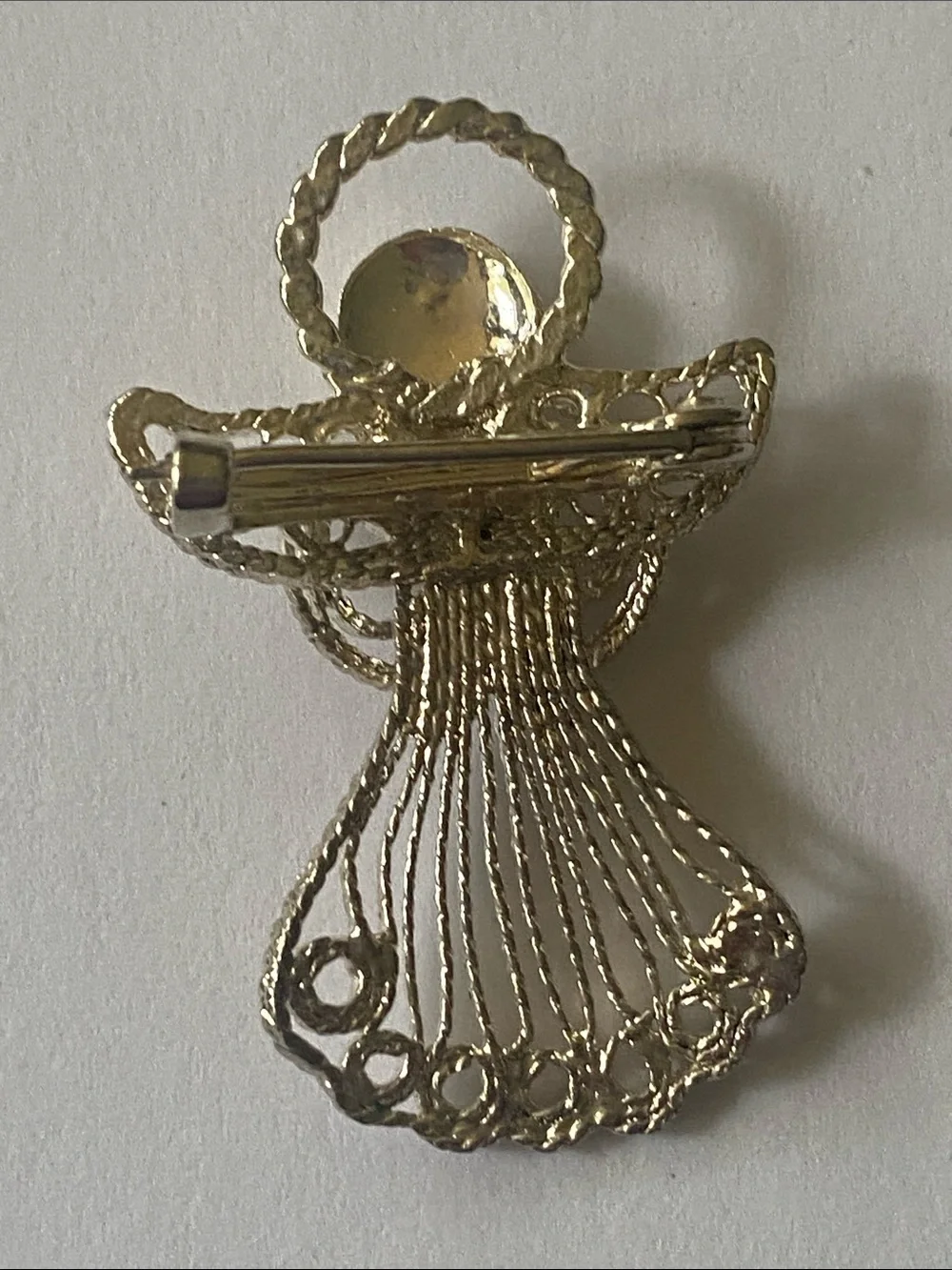 Silver tone vintage angel brooch